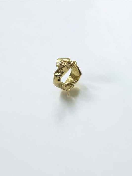 Gold ring with folds