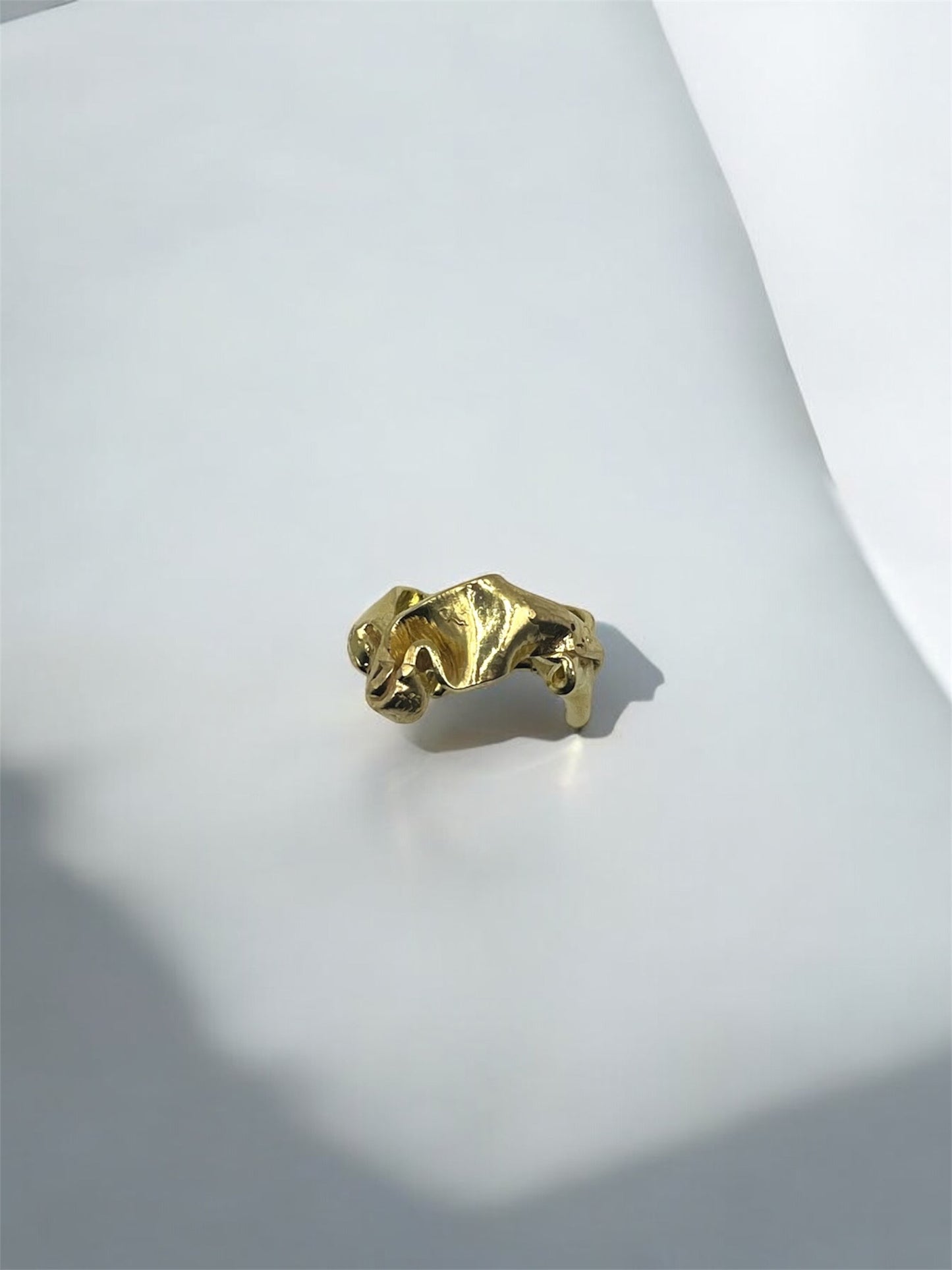 Gold ring with folds